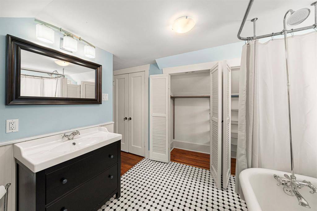 Ensuite bathroom with clawfoot tub.