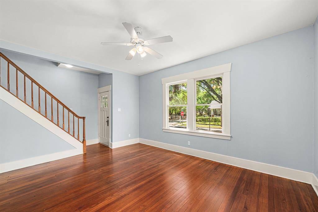 Entry at front door, opens into living area.