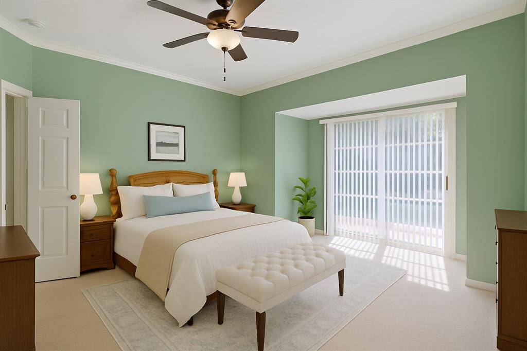 The serene primary suite offers a spacious layout with a cozy sitting area, ideal for unwinding at the end of the day. Enjoy direct access to the backyard and pool, blending indoor comfort with outdoor living.