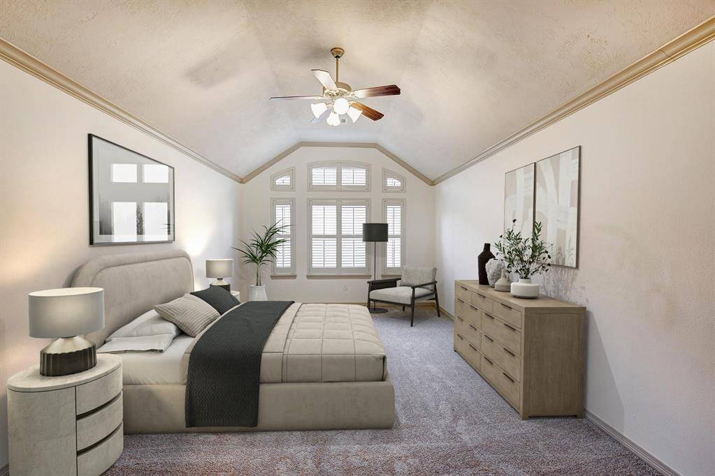 Primary bedroom with beautiful plantation shutters.