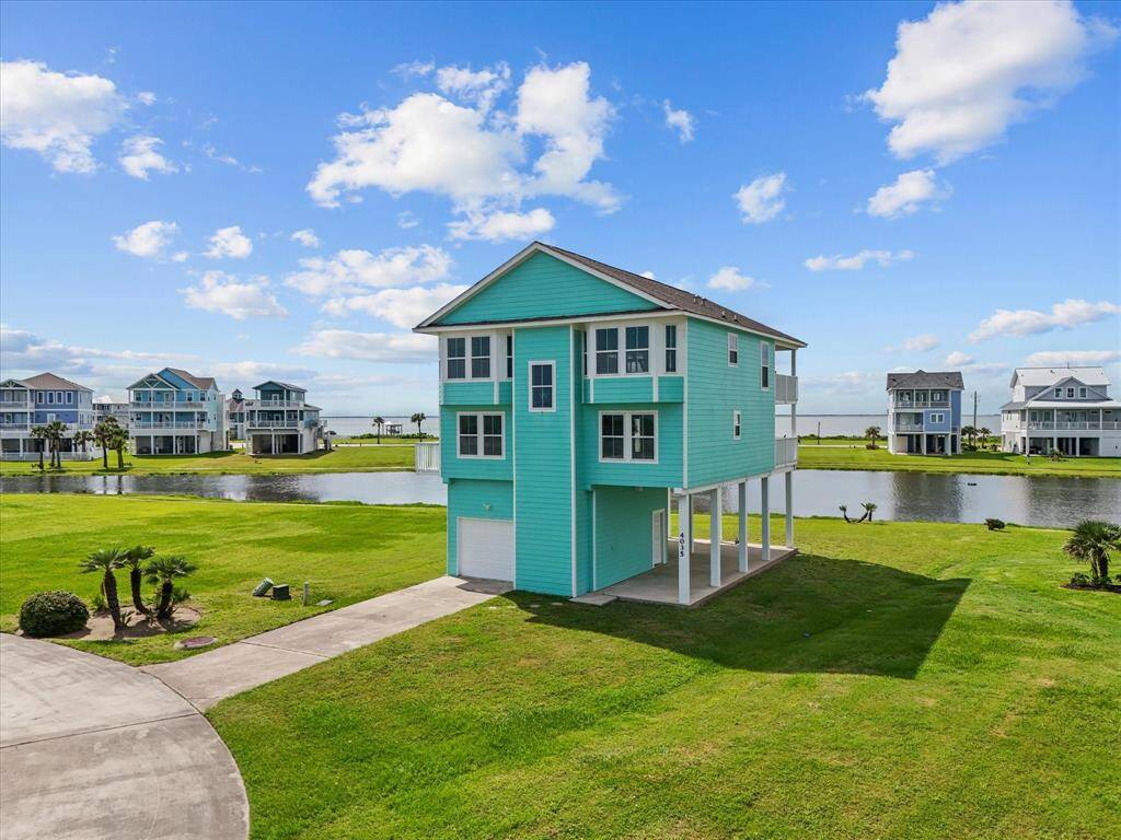The front exterior features large windows and garage entrance with unbelievable 360 views