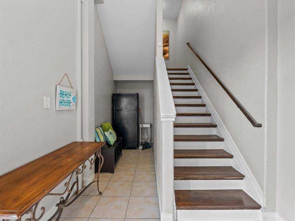 Ground Floor INSIDE Staircase from Garage and patio