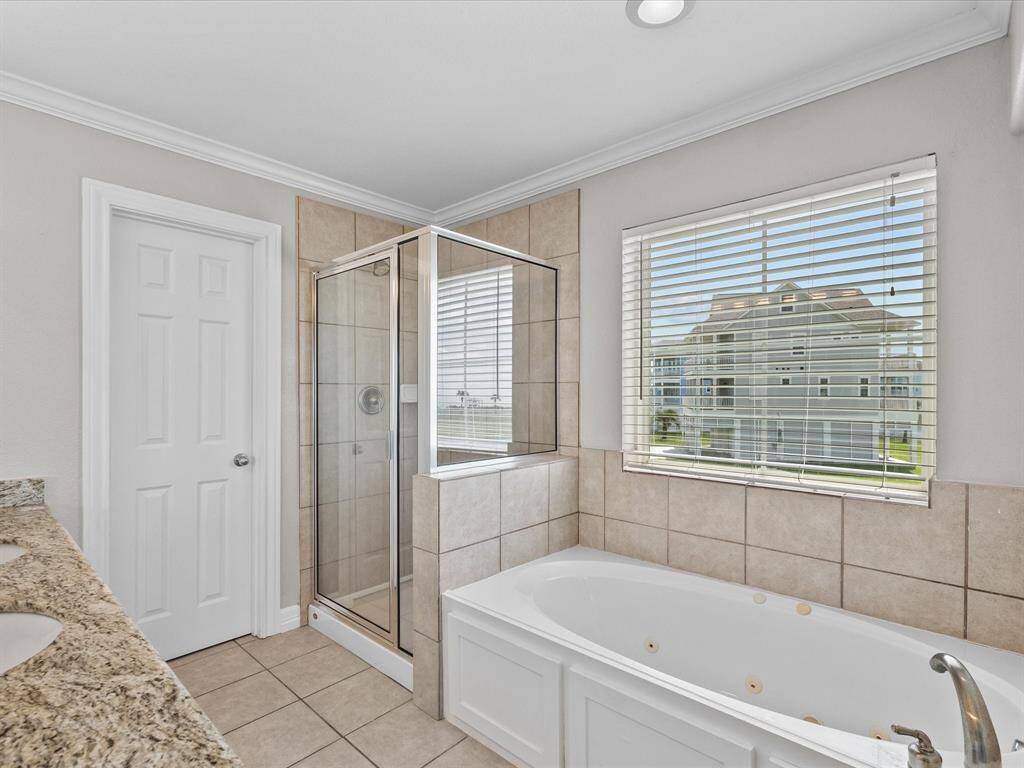 Even the ensuite bathroom has water views.