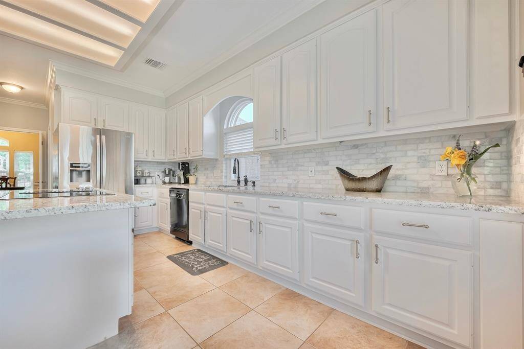 This kitchen offers ample counter space and storage!