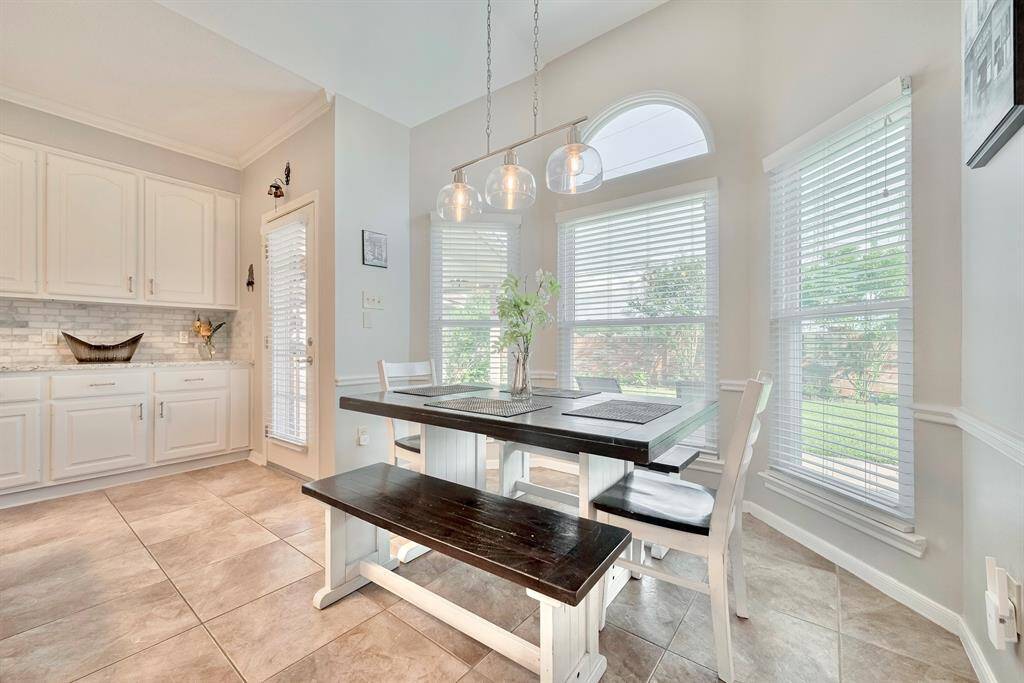 The breakfast dining area overlooks the backyard!
