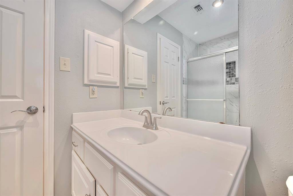 The other secondary bathroom