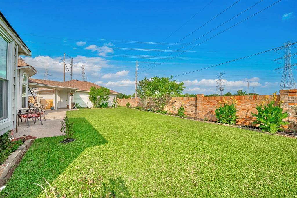 A nice fenced off space from the rest of the yard to barbeque!