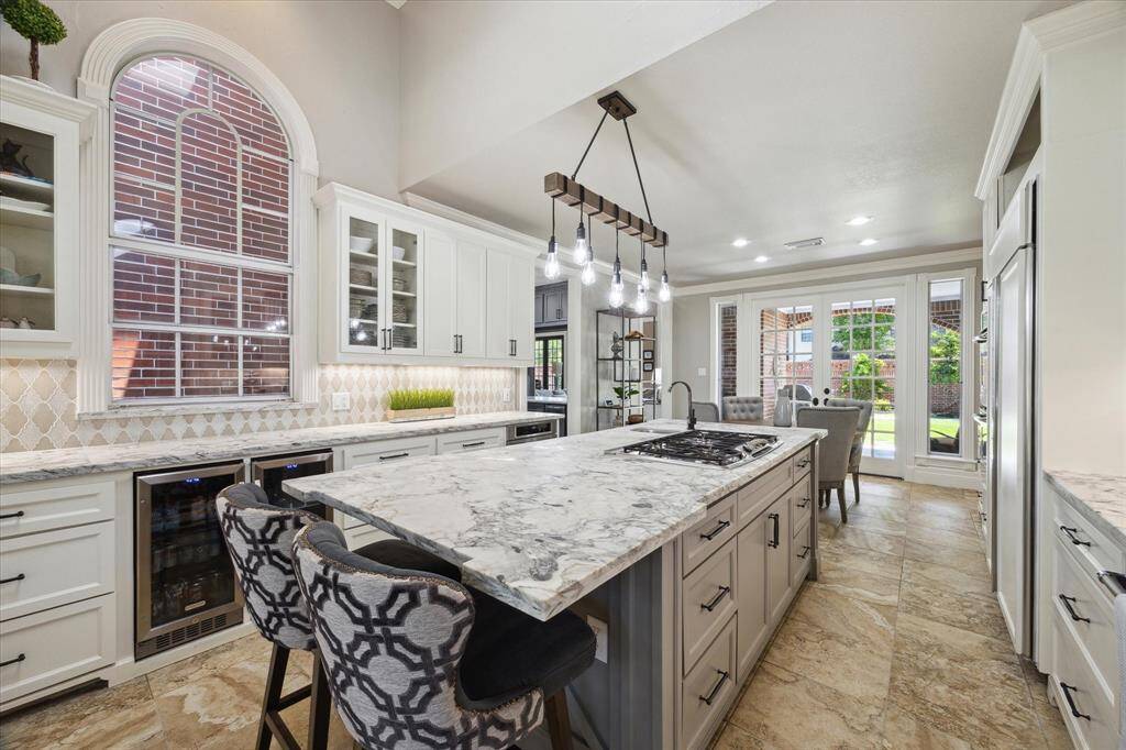 Stunning kitchen featuring breakfast bar seating.