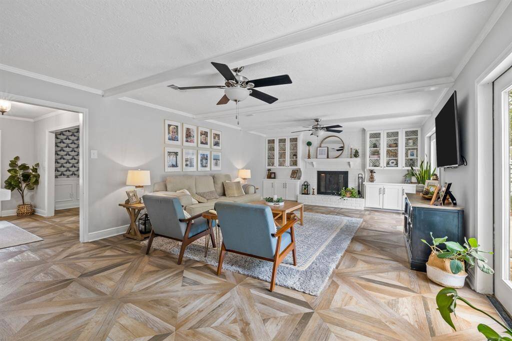 Living Room featuring wood-like parquet tile throughout 1st level
