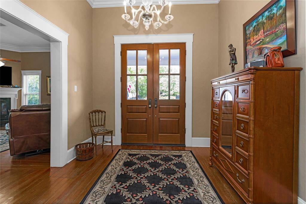 The original wood floors and crown molding were integrated into the remodel.