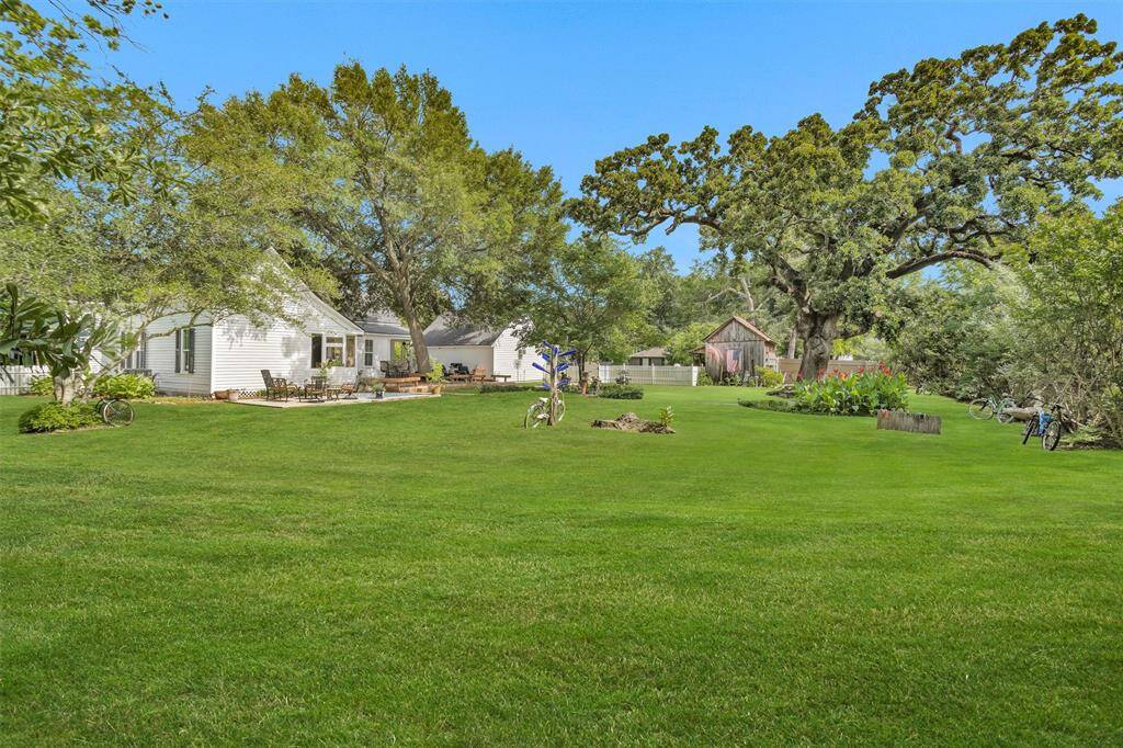 Plenty of shade trees in the back yard allows you to enjoy summer evenings on the deck.