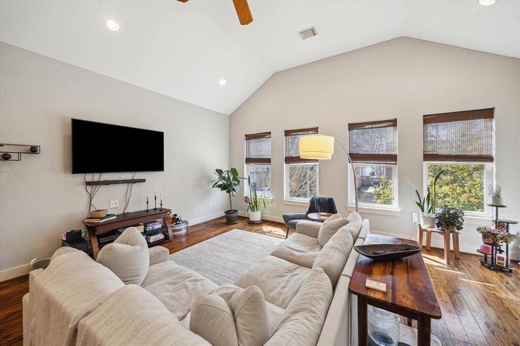 Spacious living area with abundant natural light and modern finishes.