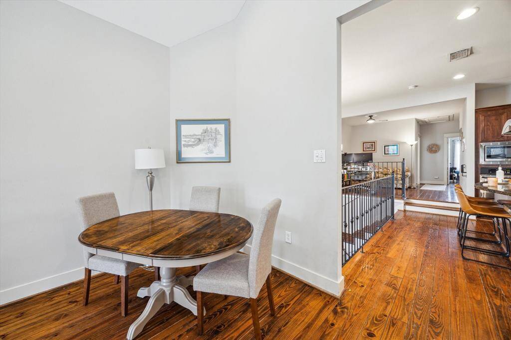 Experience airy 2nd-floor living with impressive high ceilings.