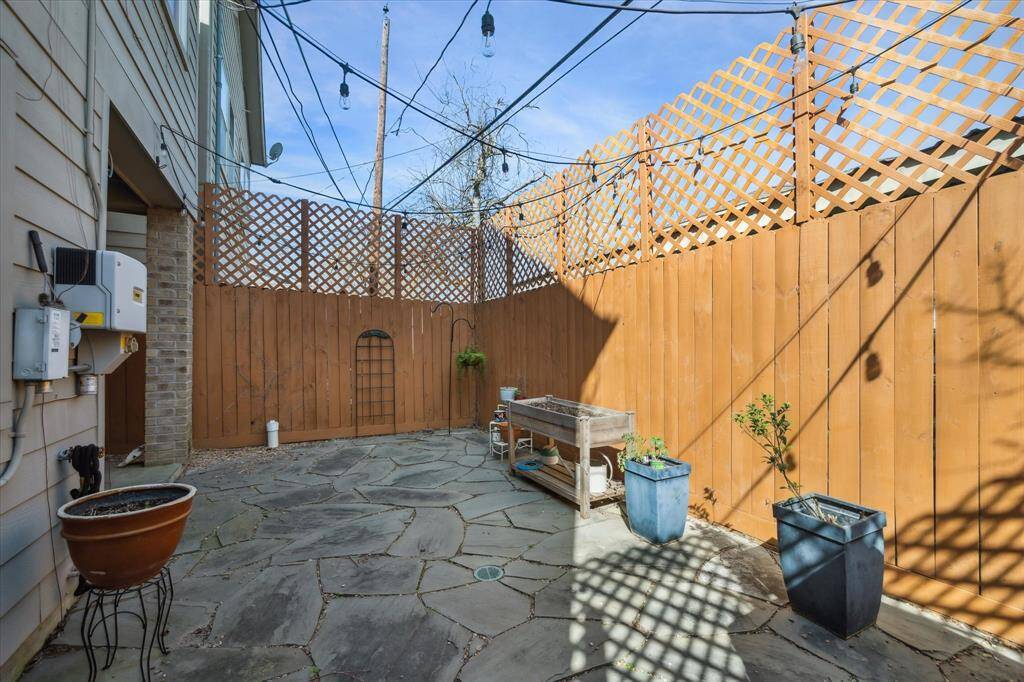 Private, fully fenced patio perfect for relaxation and entertaining.