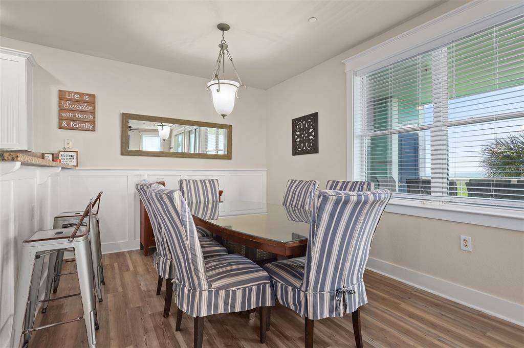 Step into elegance with this inviting dining room, perfect for family gatherings and entertaining guests.