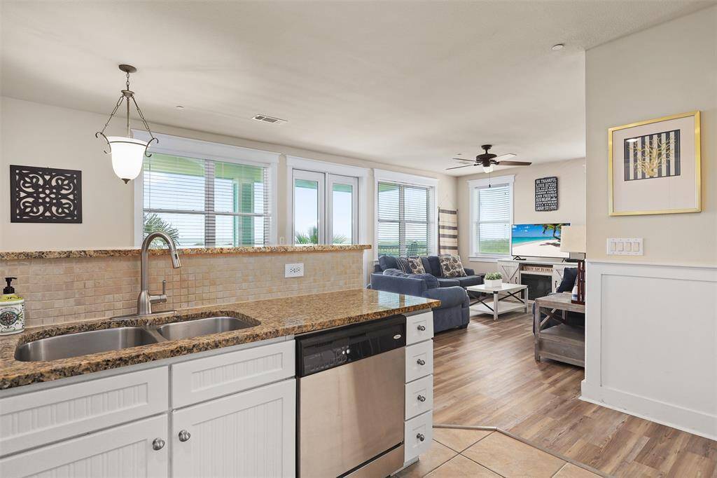 Conveying with all appliances and kitchenware, this lovely condo is ready for immediate move-in or income-producing rentals.