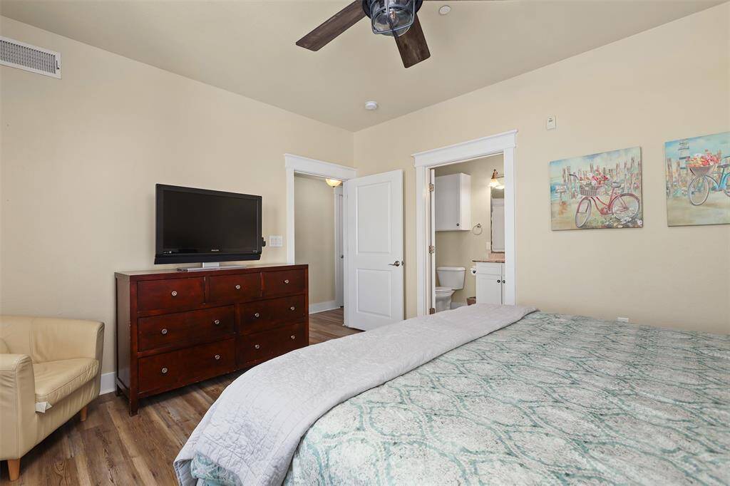 Whether you're starting your day or winding down, this primary bedroom provides the perfect retreat, complete with a private en-suite bathroom to enhance functionality.