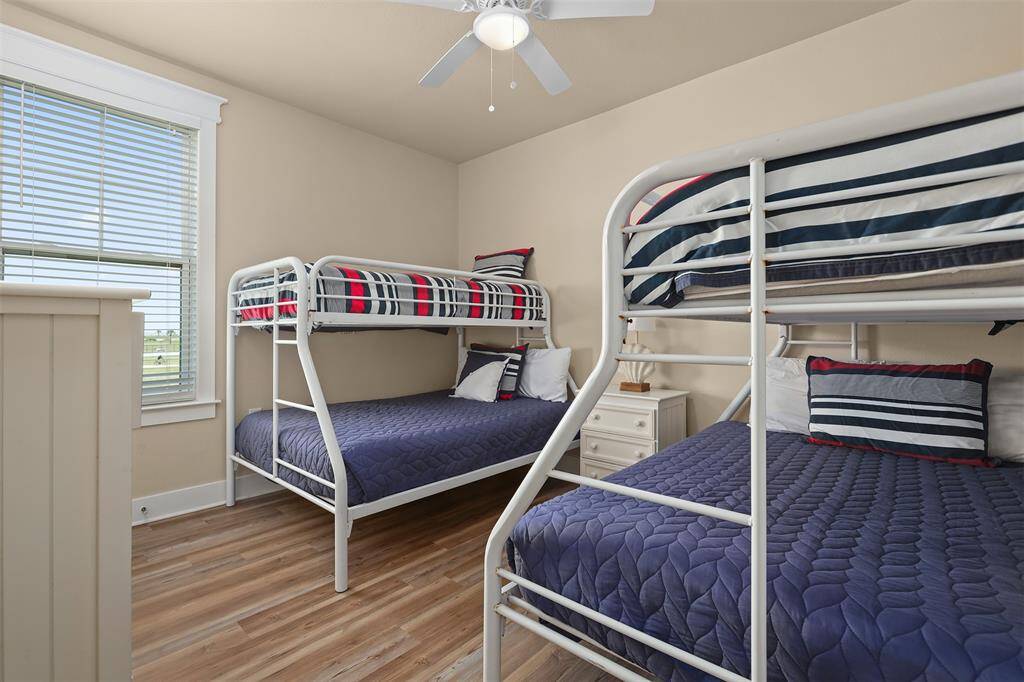 Welcome to the perfect guest bedroom, designed with families in mind. This cozy space features two sets of sturdy bunk beds, accommodating up to six guests comfortably.
