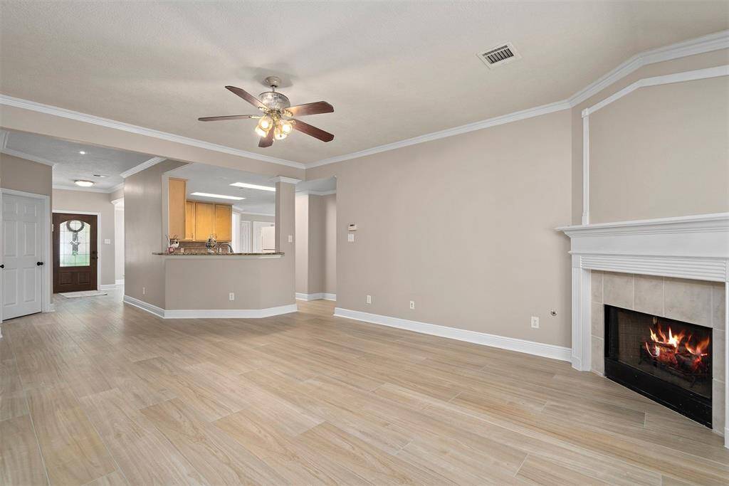 Family room looking towards kitchen and front door!