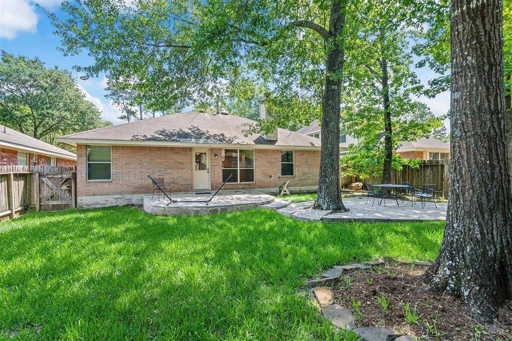 Backyard with extended patio area for entertaining!