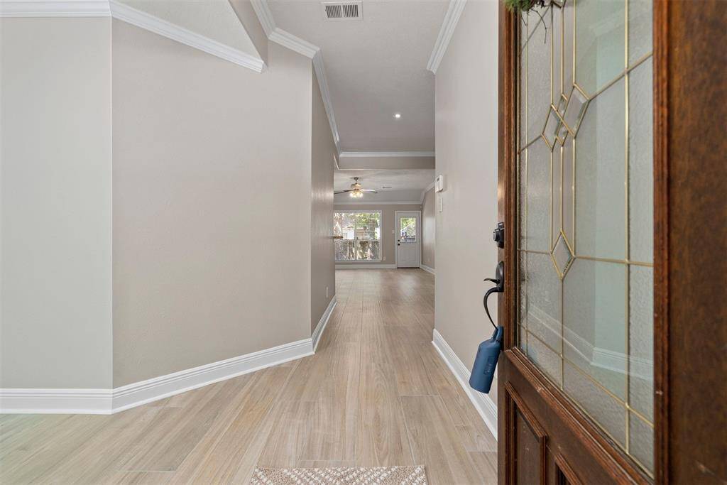 Brand new tile floors throughout that look like wood! No carpet! Fresh neutral paint throughout!
