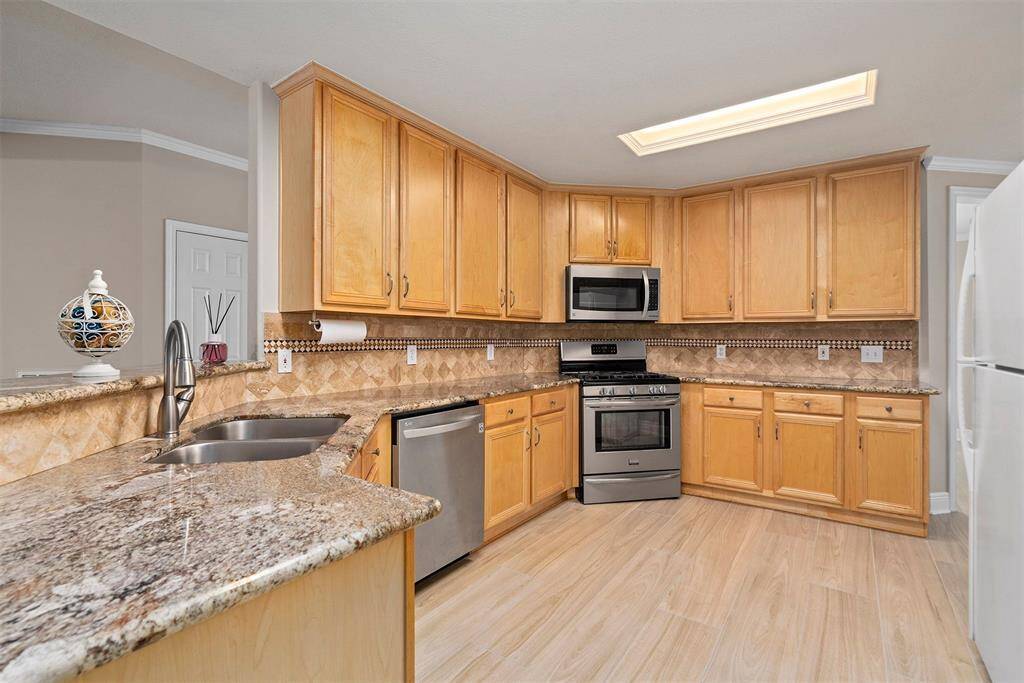 Open kitchen with double undermount stainless steel sink!