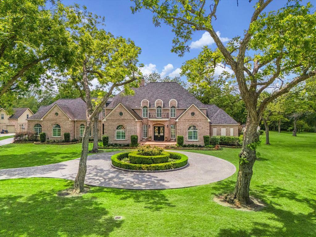 This gorgeous estate sits on two wooded acres, surrounded by 16 mature Pecan trees. The home was renovated in 2023 and is well suited for indoor and outdoor entertaining.
