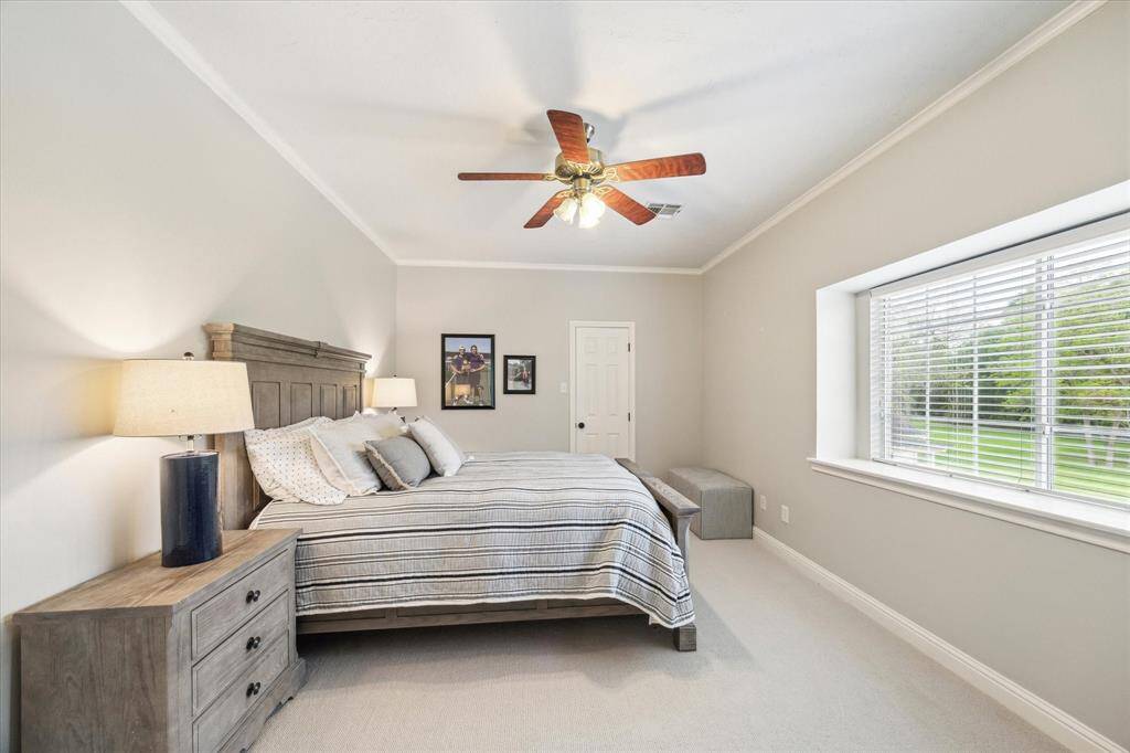 One of 3 upstairs bedrooms. This one overlooks the back yard and has a very nice sized closet.