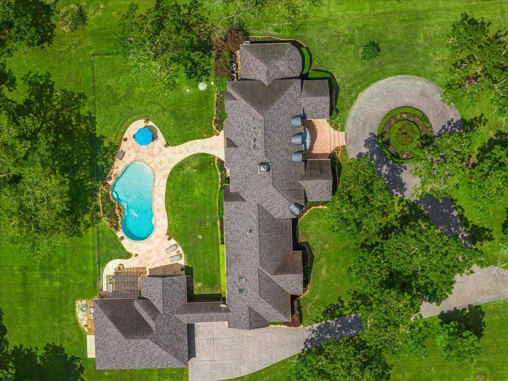 The pool area is fenced for safety, but still has plenty of room for pets or little ones.