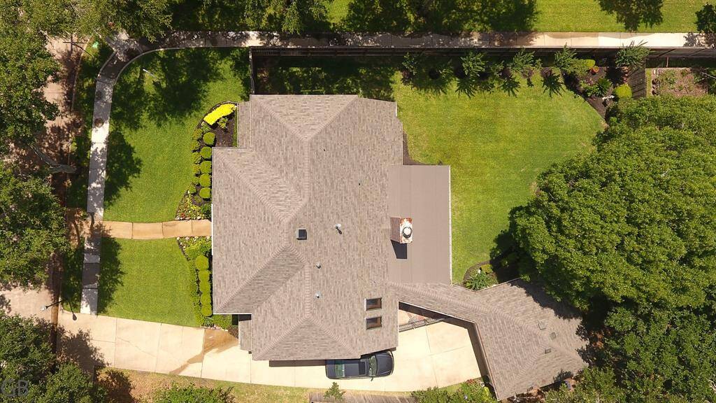 Aerial View of this corner lot. Backyard fence is lined with Crepe Myrtle’s.