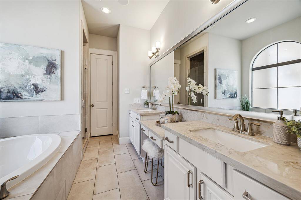 PRIMARY BATHROOM.  Luxury and tranquility continue in the primary bath with soaking tub, double vanities and separate shower.