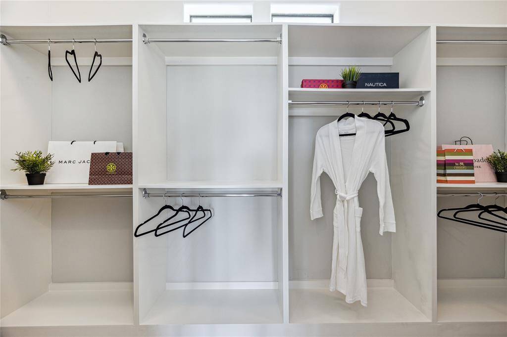 PRIMARY CLOSET.  Located off the primary bedroom and not through the bathroom.