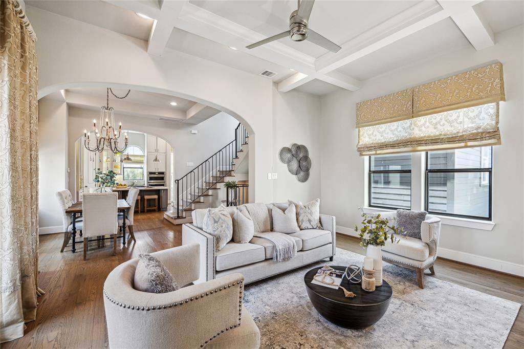 LIVING. Light filled, open, sunny main living space thanks to high ceilings, ample windows and the open sky outside every window which lets in tons of natural light.