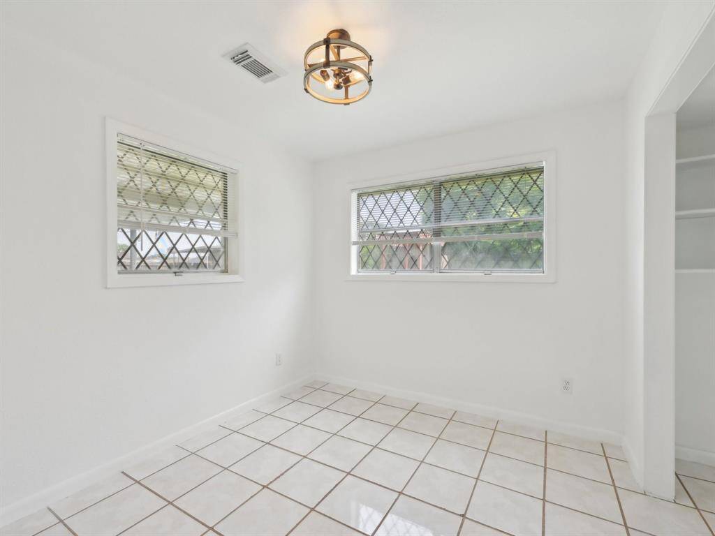 The other downstairs bedroom could be converted into a huge shoe and handbag closet. It also would make a great nursery.