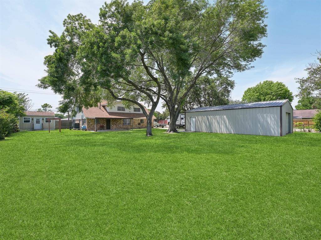 This yard is so large that you could put a pool in and still have room to spare.