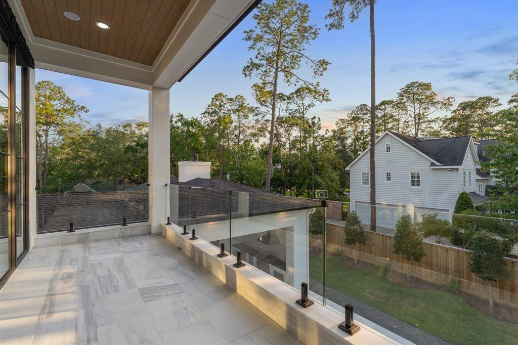Overlooking the backyard, the primary suite balcony is the perfect destination for morning coffee and after-dinner drinks alongside 180-degree views that sweep north, west and south.