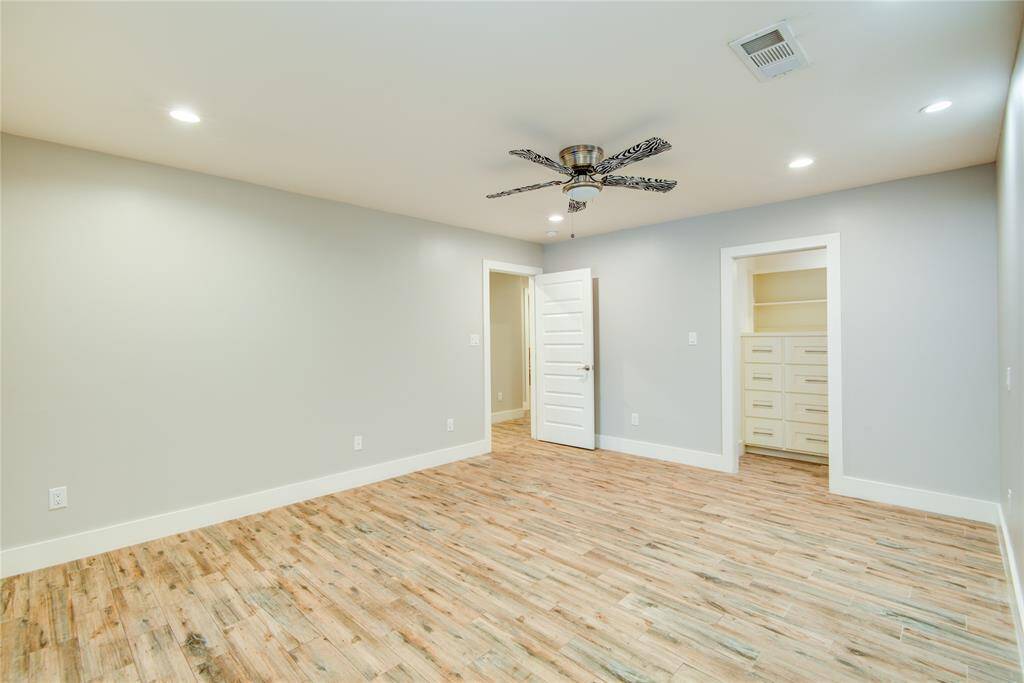 Closet has built in & pocket door