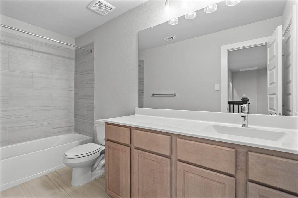 This photo is for illustrative purposes only and is not to be considered an exact replica of the finished home. Rendering does not match the finished product in terms of features, colors, landscaping, etc. Pricing, specifications, square footage and materials are subject to change at any time and without notice.