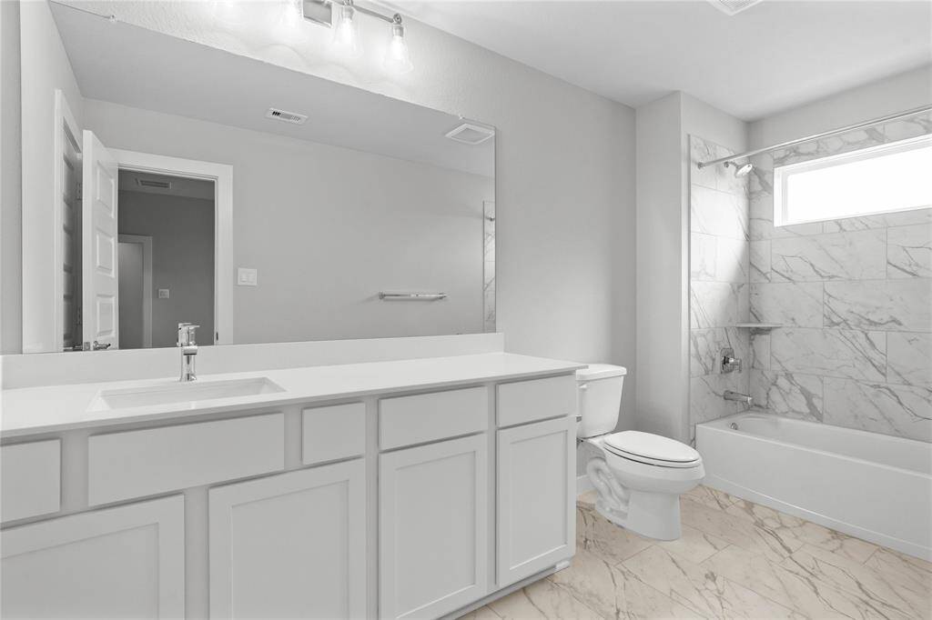 This photo is for illustrative purposes only and is not to be considered an exact replica of the finished home. Rendering does not match the finished product in terms of features, colors, landscaping, etc. Pricing, specifications, square footage and materials are subject to change at any time and without notice.