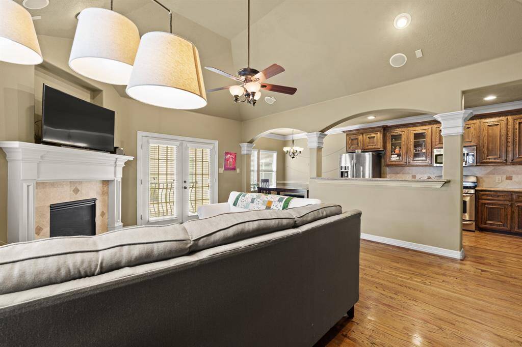 This space is perfect for entertaining with a fantastic open layout between the living room, kitchen, and dining area.