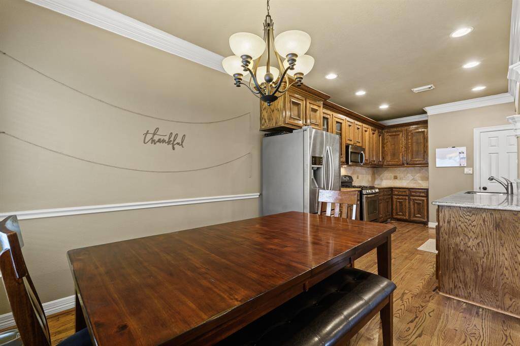 The dining area and the kitchen are seamlessly connected.
