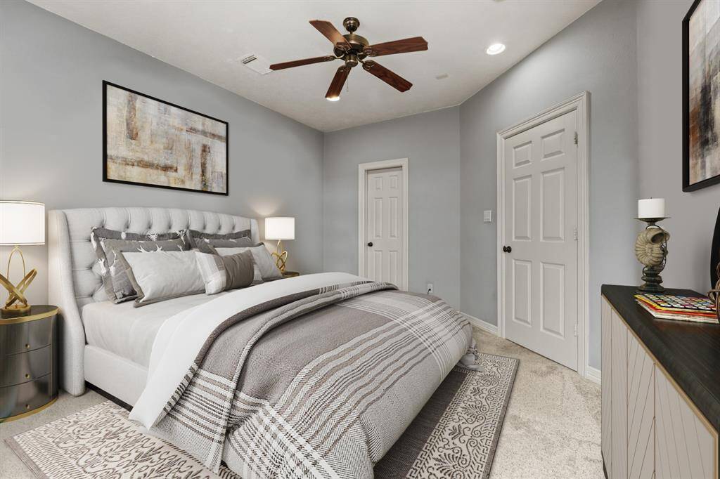 Virtually Staged: This flex room can also become a nice secondary bedroom, and it features its very own walk-in closet. This room is located on the first floor.