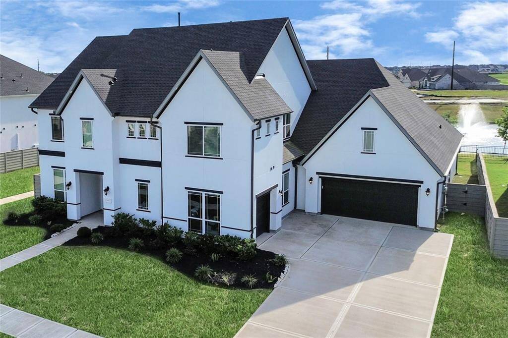 Welcome to a sanctuary of luxury and purpose, perfectly poised on the water’s edge. This exquisite waterfront residence is more than just a home—it’s an experience of expansive living and serene beauty, designed for those who seek both grandeur and connection.