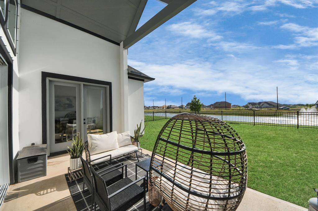 Covered patio is ideal for relaxation and outdoor entertaining.