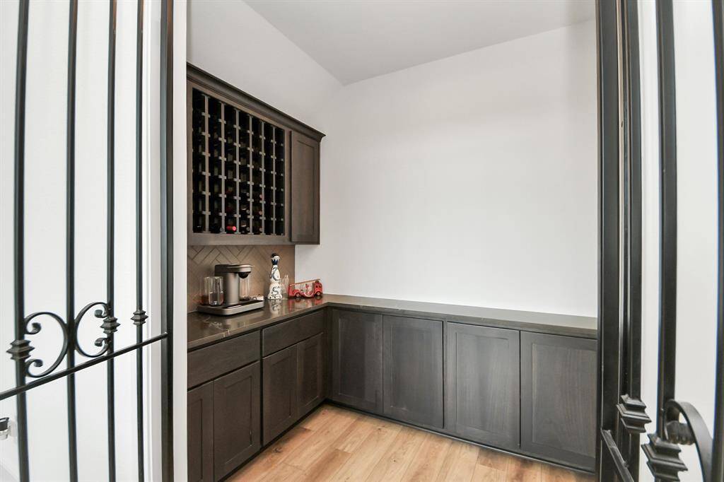 Whether you’re a seasoned collector or a casual enthusiast, this beautifully appointed Wine Room adds a touch of refinement to every gathering.