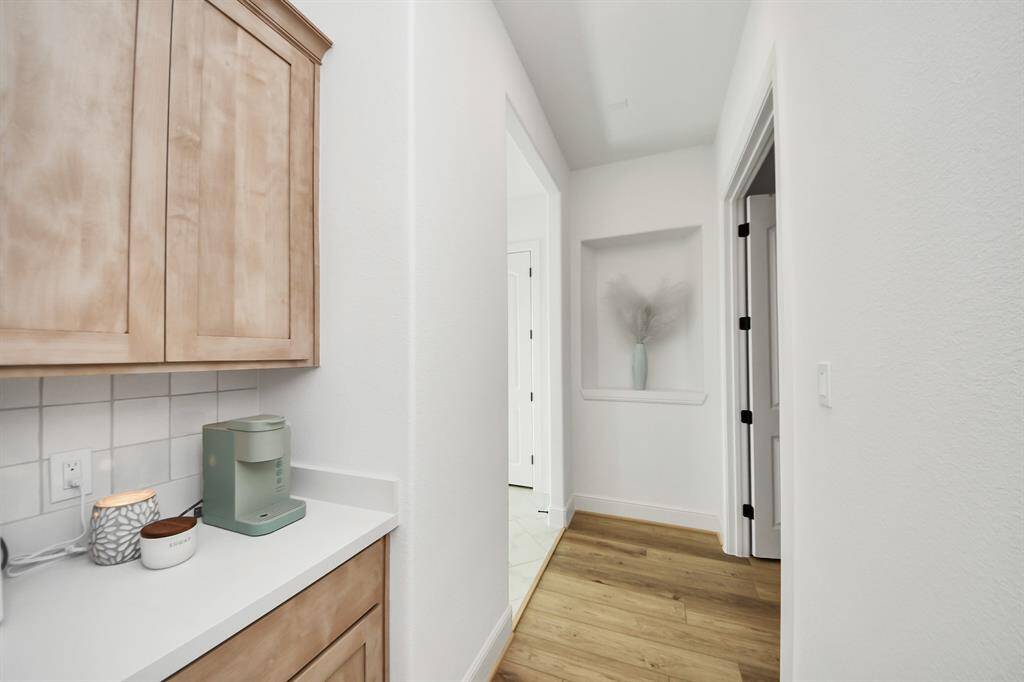 Tucked away for ultimate privacy, the Primary bathroom serves as an elegant sanctuary for retreat and relaxation.