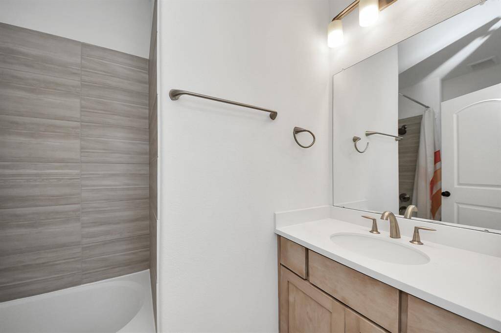 Ensuite bathroom for second bedroom down.