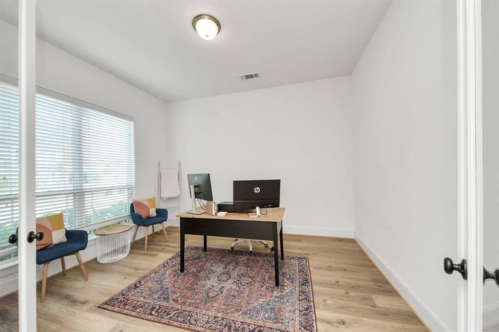 French door leads to the study in front of the house.