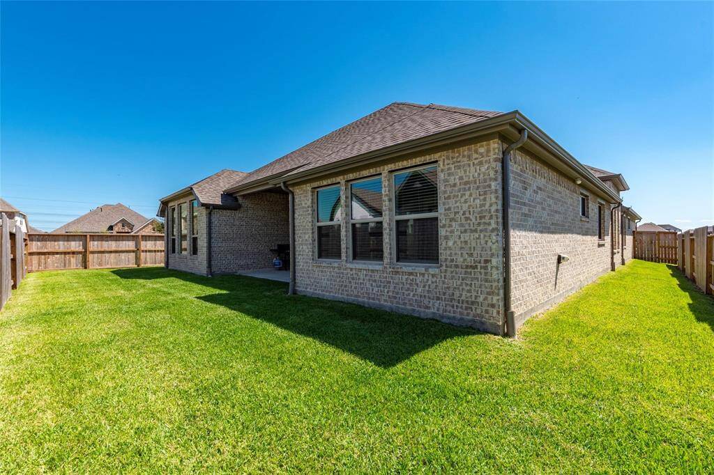 Home is bricked on all 4 sides. Ample yard space with privacy fencing on all sides.