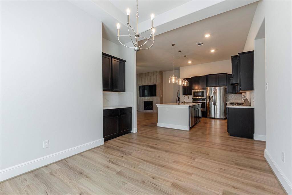 Dining room is open concept to the kitchen. Great for entertaining!